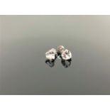 A pair of 9ct white gold aquamarine heart earrings