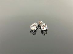 A pair of 9ct white gold aquamarine heart earrings