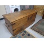 An antique oak metal bound shipping trunk CONDITION REPORT: Locked and without a key.