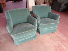 A pair of 1930's armchairs upholstered in turquoise fabric