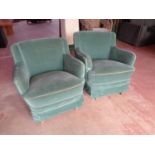 A pair of 1930's armchairs upholstered in turquoise fabric