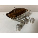 A silver purse together with four silver thimbles