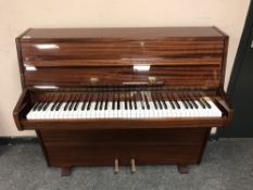 A mahogany cased mini piano by Zender