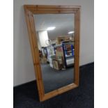 A pine framed overmantel mirror