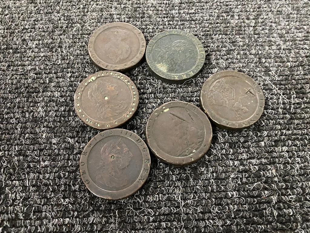 Six cartwheel pennies