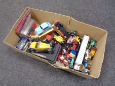 A box of assorted die cast vehicles, Matchbox, Burrago,