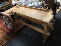 A twentieth century wood working bench fitted with vices CONDITION REPORT: