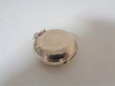 An antique silver sovereign case,