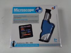 Forty-five boxed educational microscopes