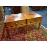 A pair of mahogany lamp tables fitted a drawer