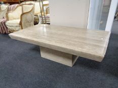 A Barker & Stonehouse travertine pedestal coffee table