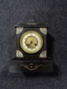 A Victorian marble and slate mantle clock