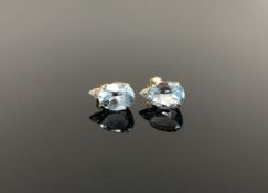 A pair of 14ct gold aquamarine and diamond earrings