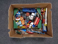 A box of play worn die cast vehicles