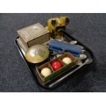A tray of Indian cigarette box, hand painted lidded box, assorted flatware, billiard balls,