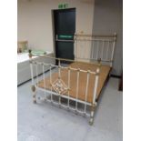 A 4' wrought iron bed frame