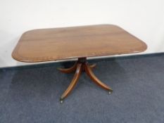 A Victorian mahogany pedestal breakfast table CONDITION REPORT: Missing castor