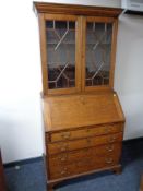 A George III oak bureau bookcase