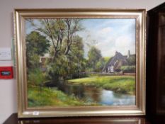 A gilt framed oil on canvas signed L.