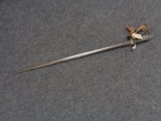 An antique officer's sword CONDITION REPORT: Hand guard seems strong without major
