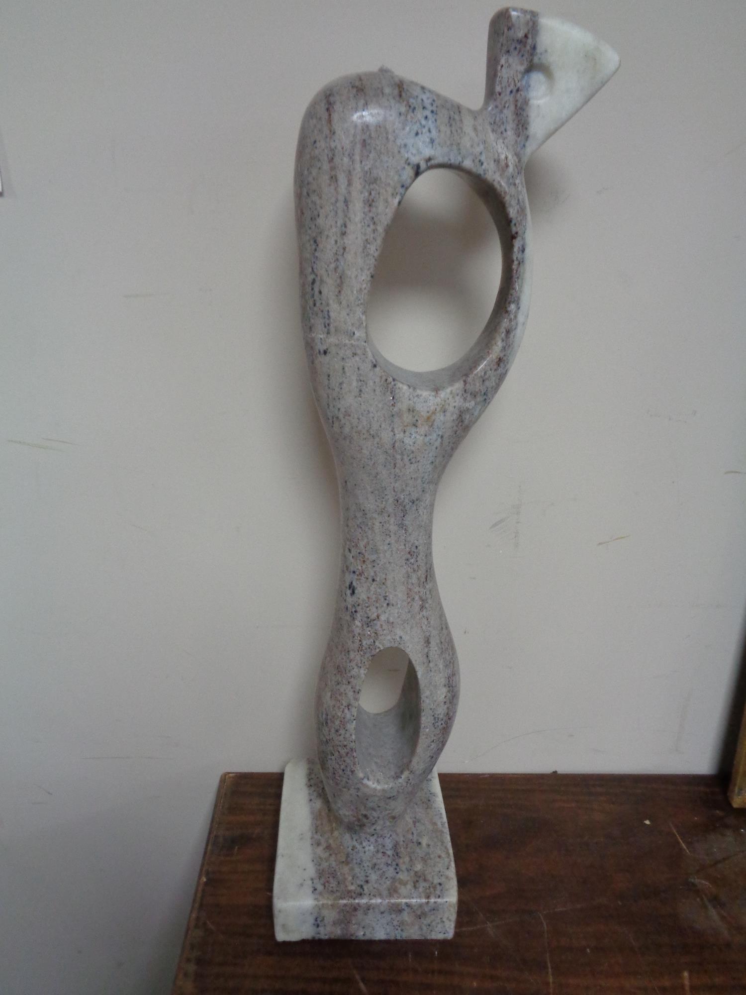 A contemporary marble abstract sculpture height 81 cm.