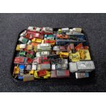 A tray of mid century and later play worn die cast vehicles, Dinky,