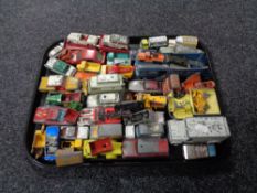 A tray of mid century and later play worn die cast vehicles, Dinky,