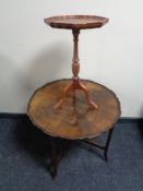 A walnut pie crust edge coffee table and a mahogany wine table