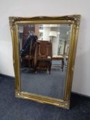 A gilt framed bevelled mirror