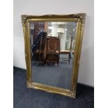 A gilt framed bevelled mirror