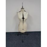 An early twentieth century adjustable mannequin on stand