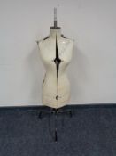 An early twentieth century adjustable mannequin on stand