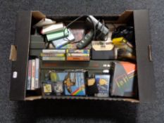 A box of Sinclair 128k ZX Spectrum with accessories and games