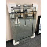 A contemporary all glass mirror,