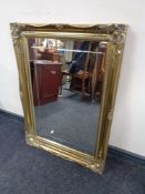 An ornate gilt framed mirror