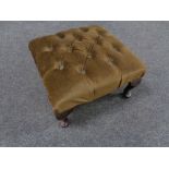 A button dralon upholstered footstool