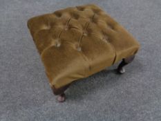 A button dralon upholstered footstool