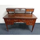 An Edwardian mahogany dressing chest (no mirror)