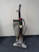 A vintage Kirby upright vacuum