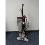 A vintage Kirby upright vacuum