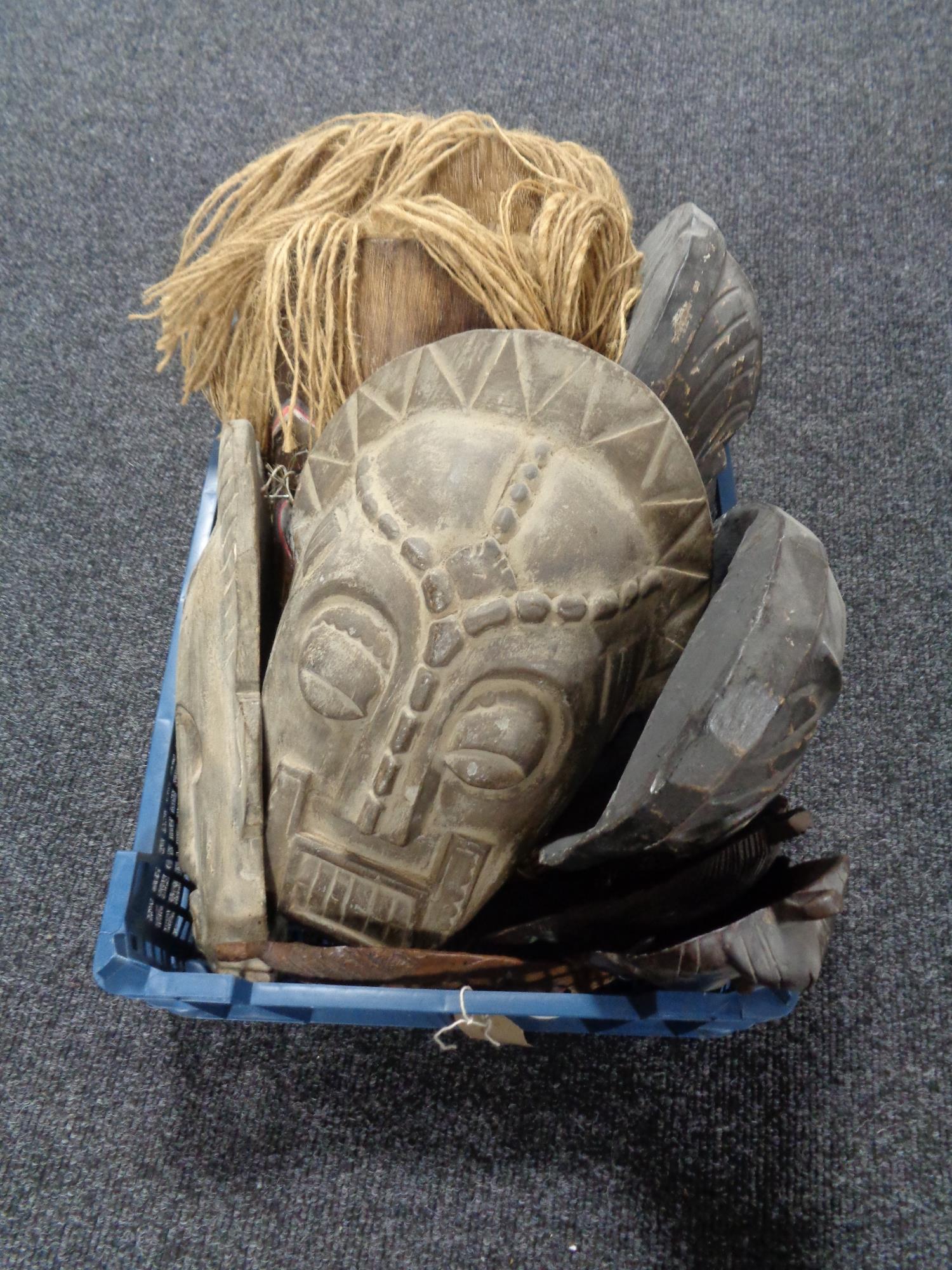 A basket of tribal masks