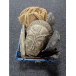 A basket of tribal masks