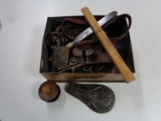 A box of miscellaneous items including antique locks, mahogany chest handles, keys, part shot flask,
