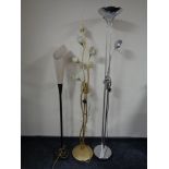 Three contemporary floor lamps