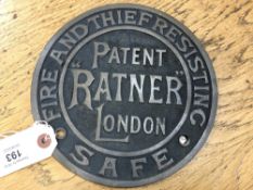 A cast metal circular safe-maker's plate : Patent Ratner, diameter 20 cm.
