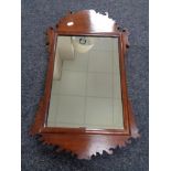 An antique mahogany Chippendale style wall mirror 36 cm x 60 cm