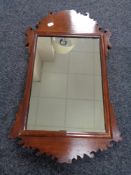 An antique mahogany Chippendale style wall mirror 36 cm x 60 cm