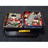 A tray of two tins of vintage lego,