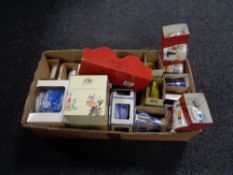 A box of boxed Ringtons china, castles tea caddy, snapshot jugs,