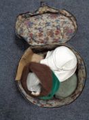 A vintage hat box of lady's hats